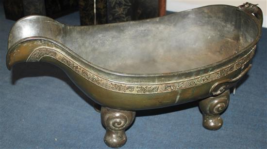 A large Chinese bronze pouring vessel, Yi, 17th / 18th century, length 74.5cm